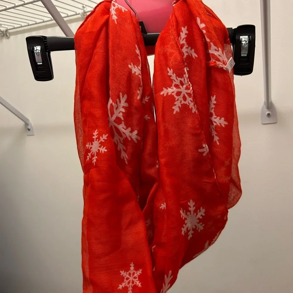 Beverly infinity scarf red with white snowflakes.